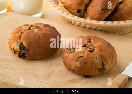 Fresh baked raisin buns for lunch Stock Photo