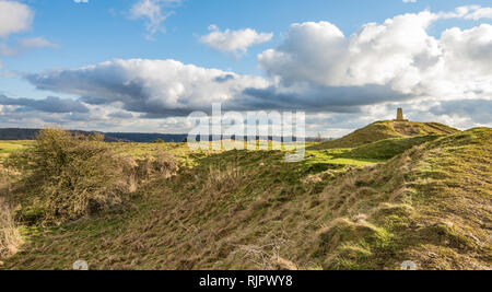 Looking across Painswick Beacon, iron age Hill Fort with Summit and Trig Point, Cotswolds, Gloucestershire,UK. Bright sunny winters day Stock Photo