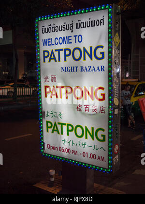 The sign at the entrance to Patpong night market in Bangkok Thailand lit up at night Stock Photo