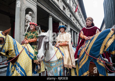 Three Wise Men on horseback in the courtyard of the Uffizi Gallery, during the historical medieval recreation. Stock Photo