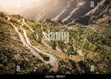 Winding mountain road (GC-605) from Mogán into mountains. South west coast of Gran Canaria, Mogan, Canary Islands, Spain Stock Photo