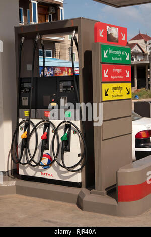 Cambodia, Preah Koh Kong, town centre, Total Petrol Station, pump, dispensing regular, premium, unleaded and diesel fuel Stock Photo