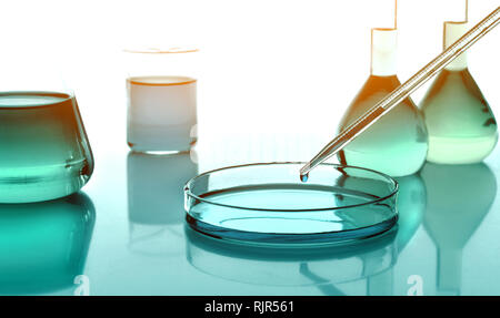 Laboratoy glassware with chemicals and liquids, chemistry science Stock Photo