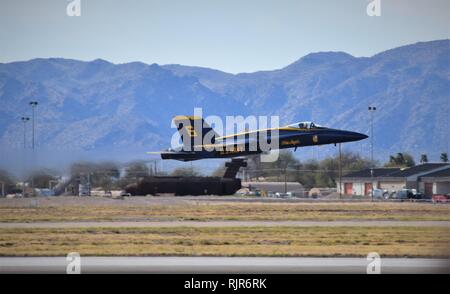 The US Navy demonstration team Blue Angels fly the F/A-18 Hornets in precise formation at the Luke Air Force Base airshow in Arizona in 2018. Stock Photo