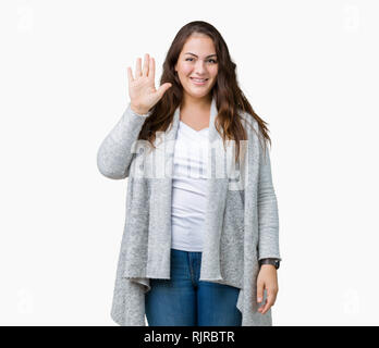 https://l450v.alamy.com/450v/rjrbtr/beautiful-plus-size-young-woman-wearing-winter-jacket-over-isolated-background-waiving-saying-hello-happy-and-smiling-friendly-welcome-gesture-rjrbtr.jpg