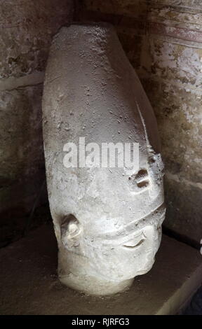 Abydos, one of the oldest cities of ancient Egypt; Head of king Rameses II's statue Stock Photo