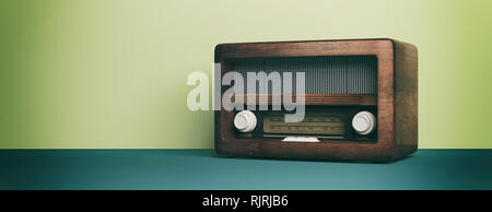 Vintage, retro radio. Radio old fashioned on green pastel wall background, banner. 3d illustration Stock Photo