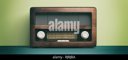Vintage, retro radio. Radio old fashioned on green pastel wall background. 3d illustration Stock Photo