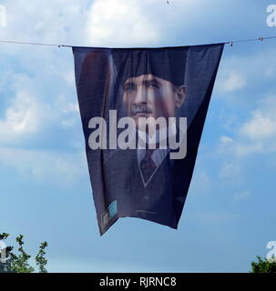 Banner with portrait of Mustafa Kemal Ataturk (1881 - 1938), founder of the Republic of Turkey. President from 1923 until his death in 1938. Ideologically a secularist and nationalist, his policies and theories became known as Kemalism. Stock Photo