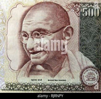 Gandhi depicted on the 500 Rupee banknote, used in India, between October 1997 and November 2016. Mohandas Karamchand Gandhi (1869 - 1948), was an Indian activist who was the leader of the Indian independence movement against British rule.