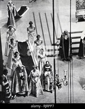 coronation of Elizabeth II of the United Kingdom, took place on 2 June 1953 at Westminster Abbey, London. Queen Elizabeth II, with the Duke of Edinburgh, at Buckingham Palace shortly after their return from Westminster Abbey Stock Photo