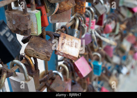 Closeup love padlocks on the wall Stock Photo