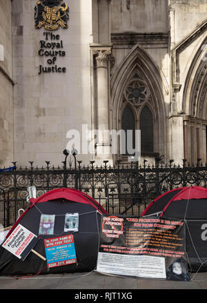 London, UK. 7th February 2019. Ongoing protest campaign against forced adoption and the unsatisfactory adoption care system in front of the Royal Courts of Justice, the Strand, London, UK, today. Credit: Joe Kuis / Alamy Live News Stock Photo