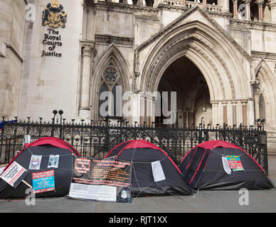 London, UK. 7th February 2019. Ongoing protest campaign against forced adoption and the unsatisfactory adoption care system in front of the Royal Courts of Justice, the Strand, London, UK, today. Credit: Joe Kuis / Alamy Live News Stock Photo