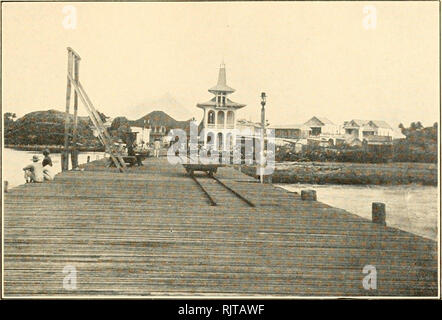 . Audubon the naturalist; a history of his life and time. Audubon, John James, 1785-1851. I.ES CAYES, HAITI: THE WHARF AND POST OFFICE; AT THE T.EFT IS SEEK A PILE OF LOGWOOD AWAITING SHIPMENT.. Please note that these images are extracted from scanned page images that may have been digitally enhanced for readability - coloration and appearance of these illustrations may not perfectly resemble the original work.. Herrick, Francis Hobart, 1858-1940. New York London, D. Appleton-Century Company, incorporated Stock Photo