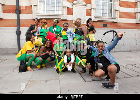 People gather for the annual 'Brixton Splash,' to mark Jamaican Independence Day on August 5, 2012 in London. Stock Photo