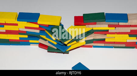 Color blocks from order to chaos and back; breach the wall (front cam, in). Stock Photo