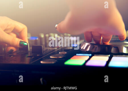 DJ Hand Mixing on Controller Stock Photo