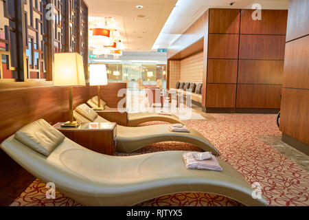 DUBAI, UAE - CIRCA APRIL, 2016: interior of Emirates business class lounge. Emirates is the largest airline in the Middle East. It is an airline based Stock Photo