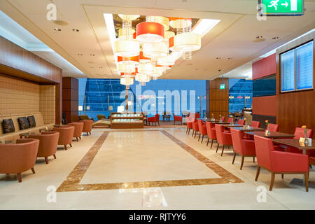 DUBAI, UAE - CIRCA APRIL, 2016: interior of Emirates business class lounge. Emirates is the largest airline in the Middle East. It is an airline based Stock Photo