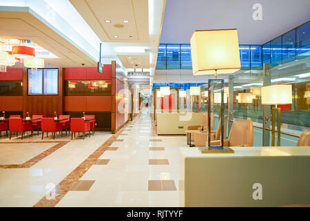 DUBAI, UAE - CIRCA APRIL, 2016: interior of Emirates business class lounge. Emirates is the largest airline in the Middle East. It is an airline based Stock Photo