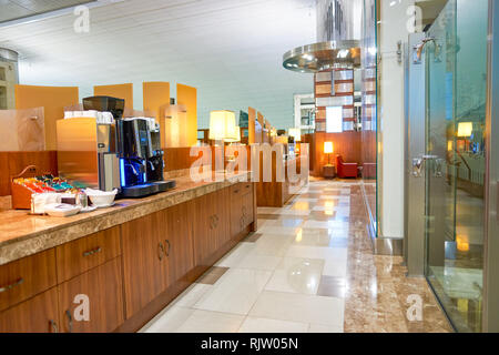 DUBAI, UAE - CIRCA APRIL, 2016: interior of Emirates business class lounge. Emirates is the largest airline in the Middle East. It is an airline based Stock Photo