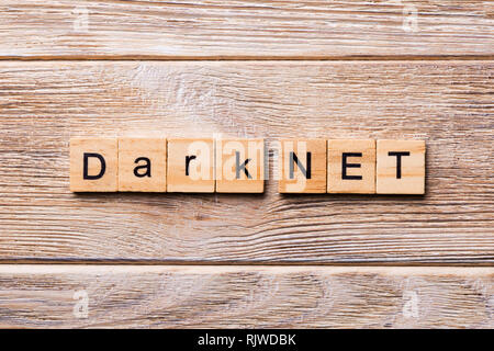 dark net word written on wood block. dark net text on wooden table for your desing, concept. Stock Photo