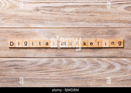 Digital Marketing word written on wood block. Digital Marketing text on wooden table for your desing, concept. Stock Photo