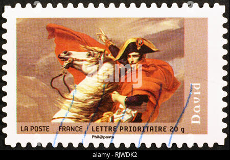 Napoleon on detail of famous painting by David, postage stamp Stock Photo