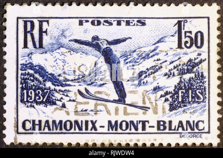 Vintage stamp showing a ski jumper in Chamonix Stock Photo