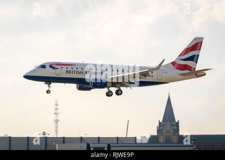 London, England. February 2018. Embraer ERJ-170STD British Airways G-LCYD operated by BA CityFlyer landing at London City Airport (LCY) Stock Photo