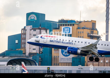London, England. February 2018. Embraer ERJ-190SR British Airways G-LCYN operated by BA Cityflyer landing at London City Airport (LCY) Stock Photo