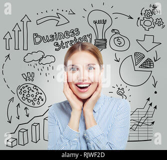 Smiling businesswoman with infographics and lightbulb. Business strategy and start up concept Stock Photo