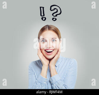 Cute woman and question mark. Brainstorm and ideas concept Stock Photo