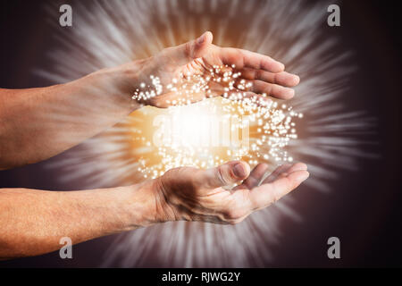 Close-up Of Mysterious Glowing Power In The Hands Stock Photo