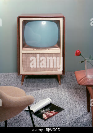 Television in the 1950s. A Grundig television set that was available for customers 1957. A typical 1950s design with a wooden case. ref BV66-1 Stock Photo