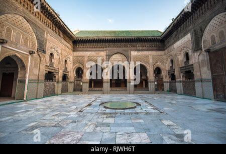 Inside interior of The Madrasa Bou Inania ( Medersa el Bouanania ) is acknowledged as an excellent example of Marinid architecture in Fes Fez Morocco Stock Photo