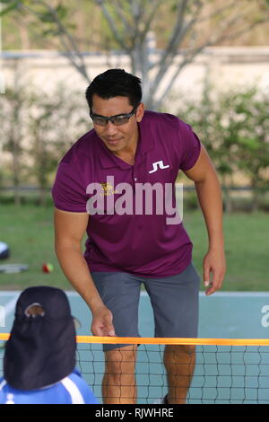 Internationally renowned Thai former tennis champion Paradorn Srichaphan coaches young students at an international school in Hua Hin. Stock Photo