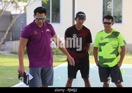 Internationally renowned Thai former tennis champion Paradorn Srichaphan coaches young students at an international school in Hua Hin. Stock Photo