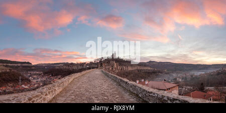 Beautiful panoramic view of medieval Tsarevets fortress in Veliko Tarnovo, Bulgaria during sunrise in the morning. Stock Photo