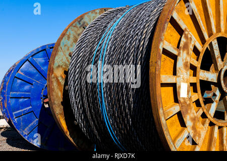 Oil Industry New cable hawsers round drums stored Montrose Quayside UK Stock Photo