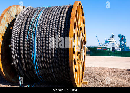 Oil Industry New cable hawsers round drums stored Montrose Quayside UK Stock Photo