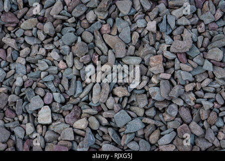 Close up of Gravel from Red and Gray Stones Background Image Stock Photo