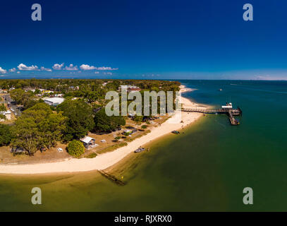 Aerial drone view of Bongaree Jetty on Bribie Island, Sunshine Coast, Queensland, Australia Stock Photo