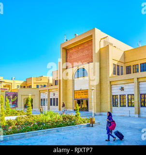 YAZD, IRAN - OCTOBER 19, 2017: The entrance portal of main bus station with modern geometrical decorations, on October 19 in Yazd Stock Photo