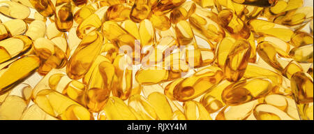 Transparent capsules illuminated from behind Stock Photo