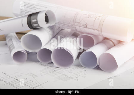 Workplace of architect - construction drawings on the table Stock Photo