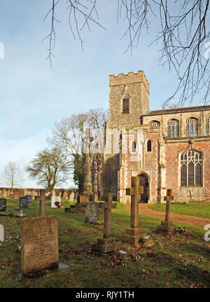 A view of the South Porch and Tower of the parish church of St Mary in South Norfolk at Shelton, Norfolk, England, United Kingdom, Europe. Stock Photo