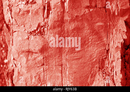 Abstract granite stone wall texture Coral color. Stock Photo