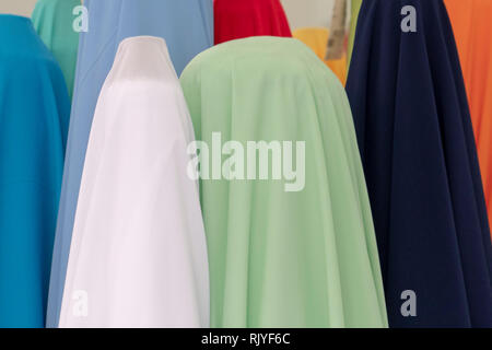Burqa Color Varieties fabric for sale looks like burqa different colors Stock Photo - Alamy